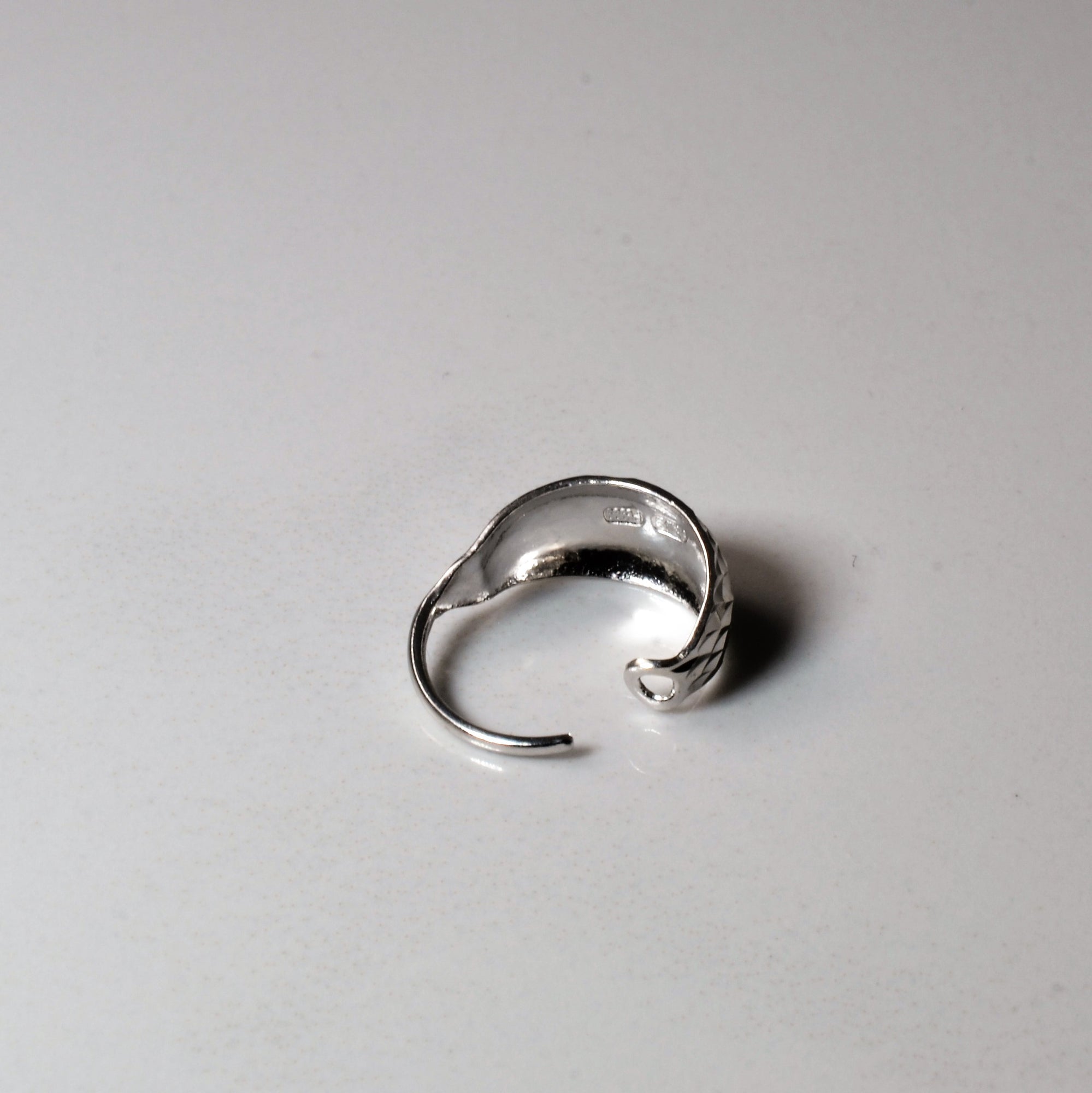 Platinum Huggie Earrings |