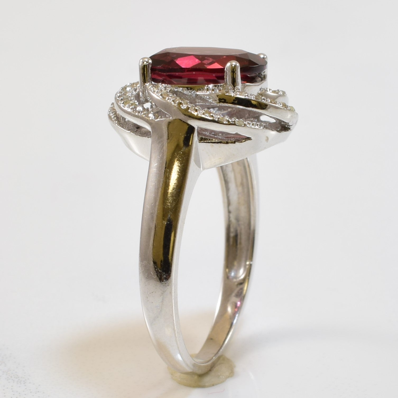 Garnet & Diamond Twisted Halo Ring | 2.80ct, 0.16ctw | SZ 7 |